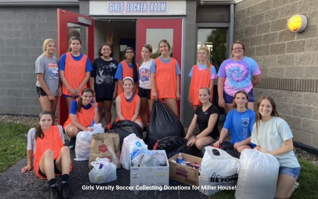 Girls Soccer Team Donates to Miller Community House